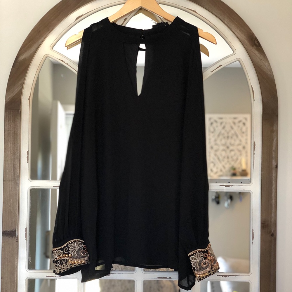 Cold shoulder sequin blouse